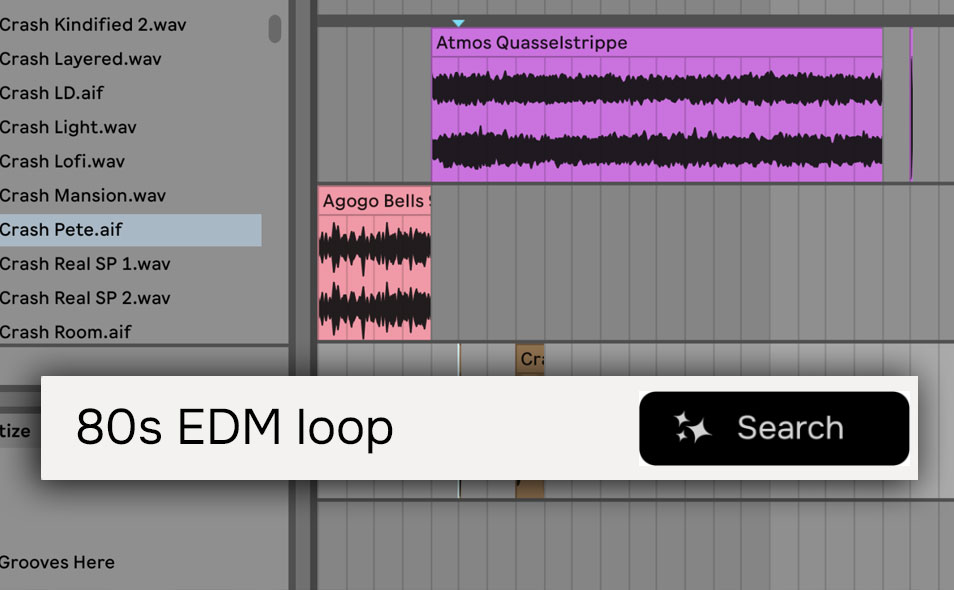 A producer at a keyboard and controller in a studio